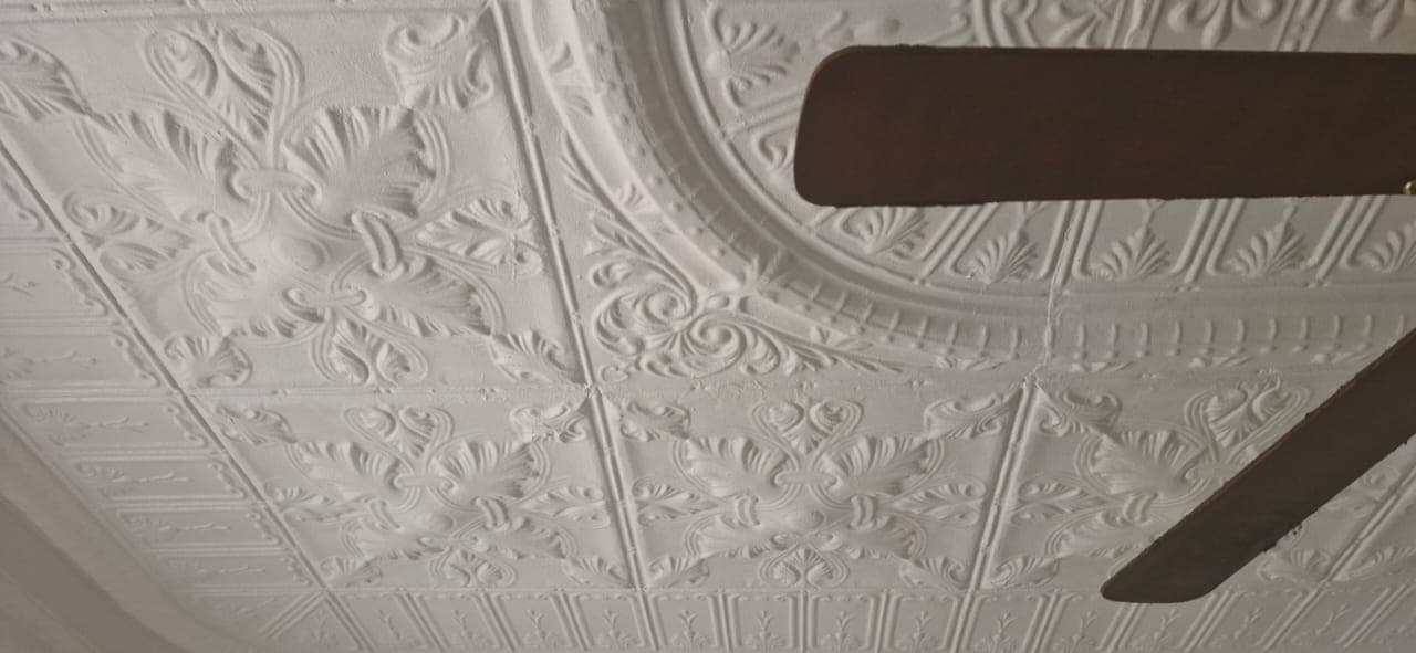 Finished decorative ceiling with fan